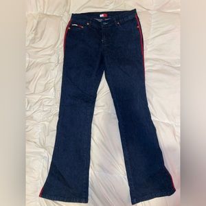 Tommy Hilfiger dark blue Jean with red stitching down the seam, slits